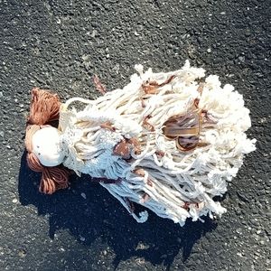 Mop doll decoration with cookie cutter.